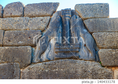 Lion's gate, the main entrance of the citadel of Mycenae. Archaeological site of Mycenae in Peloponnese, Greece Lion's gate, the main entrance of the citadel of Mycenae. Archaeological site of Mycenae in Peloponnese, Greece 140433178
