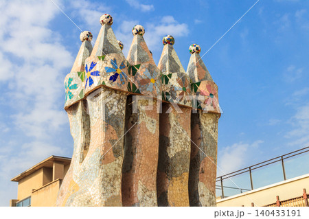 The arched roof and chimney of Casa Batllo designed by Antoni Gaudi in Barcelona, Spain 140433191