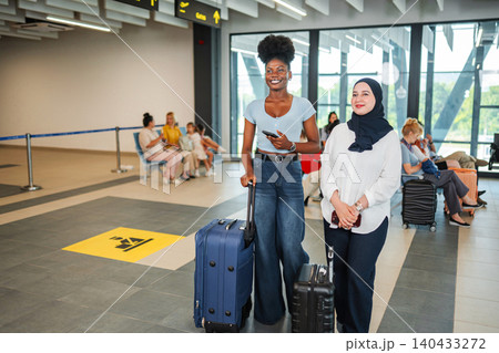 Diverse friends traveling at airport terminal on journey 140433272