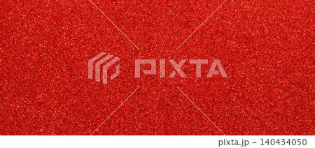 Sparkling red glitter background texture with shimmering particles for festive design Sparkling red glitter background texture with shimmering particles for festive design 140434050