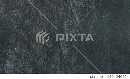 Dark gray concrete texture with rough weathered surface and golden bronze accent marks 140434055