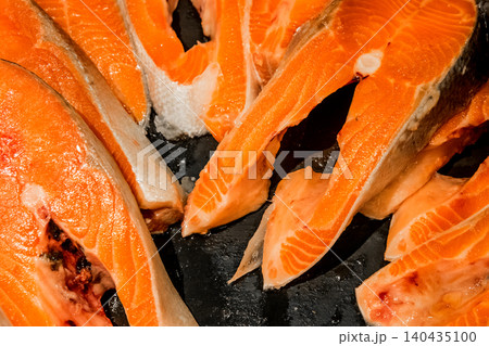 Raw salmon steak fish fresh seafood supermarket counter background sea food freshness 140435100