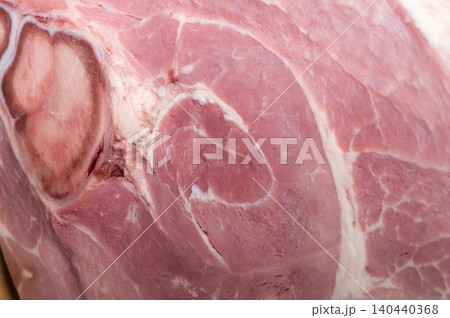A large piece of HAM on a wooden background. A large piece of HAM on a wooden background. 140440368