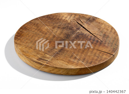 Round Rustic Wooden Cutting Board Isolated on White Background Round Rustic Wooden Cutting Board Isolated on White Background 140442367
