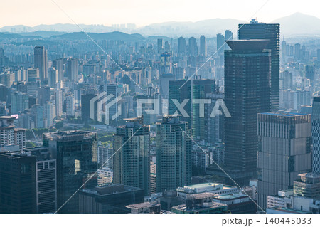 High-angle panoramic view of Yeouido financial district skyscrapers and the Han River on a clear summer afternoon in Seoul, South Korea High-angle panoramic view of Yeouido financial district skyscrapers and the Han River on a clear summer afternoon in Seoul, South Korea 140445033