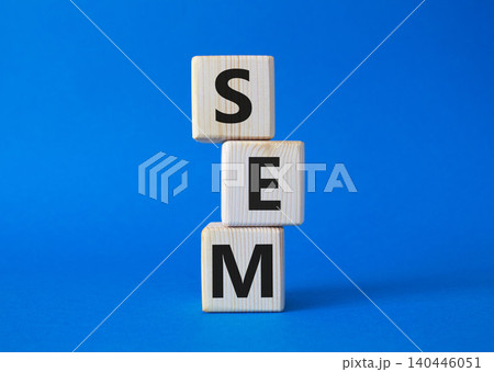 SEM - Search Engine Marketing symbol. Wooden cubes with words SEM. Beautiful blue background. Business and SEM concept. Copy space. SEM - Search Engine Marketing symbol. Wooden cubes with words SEM. Beautiful blue background. Business and SEM concept. Copy space. 140446051