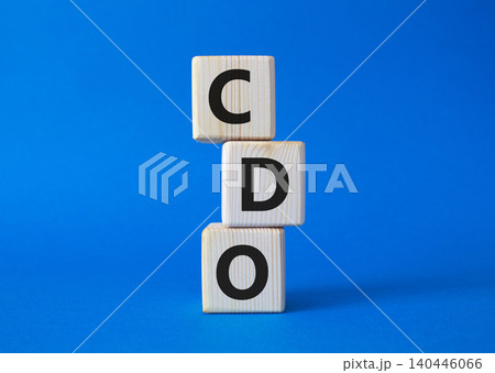 CDO - Collateralized Debt Obligation symbol. Wooden cubes with word CDO. Beautiful blue background. Business and Collateralized Debt Obligation concept. Copy space. CDO - Collateralized Debt Obligation symbol. Wooden cubes with word CDO. Beautiful blue background. Business and Collateralized Debt Obligation concept. Copy space. 140446066