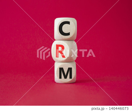 CRM - Customer relationship management symbol. Concept word CRM on wooden cubes. Beautiful red background. Business and CRM concept. Copy space. CRM - Customer relationship management symbol. Concept word CRM on wooden cubes. Beautiful red background. Business and CRM concept. Copy space. 140446073