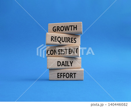 GROWTH symbol. Wooden blocks with words GROWTH REQUIRES CONSISTENT DAILY EFFORT. Beautiful blue background. Business and GROWTH concept. Copy space GROWTH symbol. Wooden blocks with words GROWTH REQUIRES CONSISTENT DAILY EFFORT. Beautiful blue background. Business and GROWTH concept. Copy space 140446082