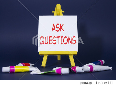 Ask Questions symbol. Wooden blocks with words Ask Questions. Beautiful deep blue background with paints and easel. Business and Ask Questions concept. Copy space. Ask Questions symbol. Wooden blocks with words Ask Questions. Beautiful deep blue background with paints and easel. Business and Ask Questions concept. Copy space. 140446111