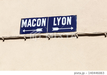 Lyon and Macon sign direction on a wall in France Lyon and Macon sign direction on a wall in France 140446863