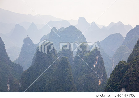 famous karst mountains in Yangshuo District, Guangxi Province, China famous karst mountains in Yangshuo District, Guangxi Province, China 140447706
