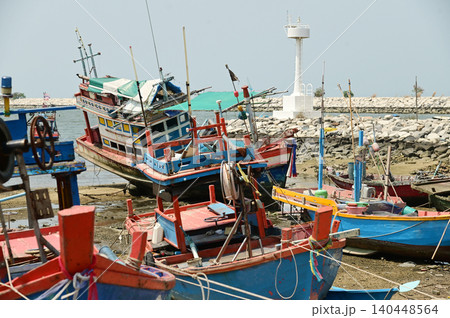 Fishing boats are anchored at the mouth of the river, near Ban Amphoe beach. Thailand. Fishing boats are anchored at the mouth of the river, near Ban Amphoe beach. Thailand. 140448564