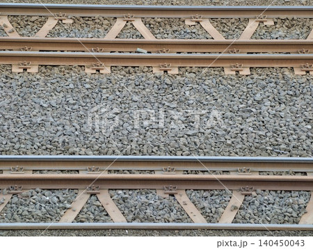 Parallel railway tracks on ballast with steel sleepers and fastenings Parallel railway tracks on ballast with steel sleepers and fastenings 140450043