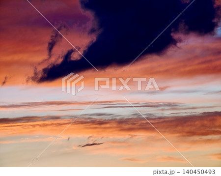 Dramatic sunset sky with glowing clouds Dramatic sunset sky with glowing clouds 140450493