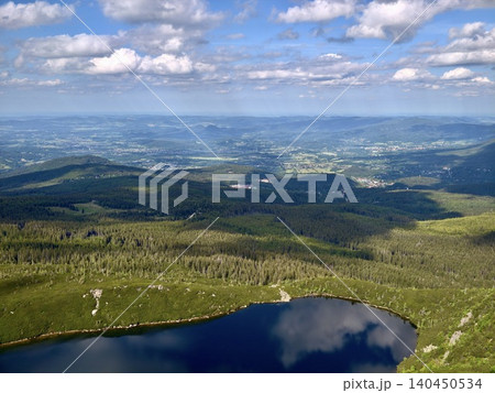 Panoramic mountain landscape with lake, forest, and expansive valley Panoramic mountain landscape with lake, forest, and expansive valley 140450534