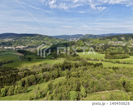 Pastoral Rural Scenery. Serene Pastoral Landscape Featuring Vibrant Farmlands And Dense Wooded Areas Pastoral Rural Scenery. Serene Pastoral Landscape Featuring Vibrant Farmlands And Dense Wooded Areas 140450828