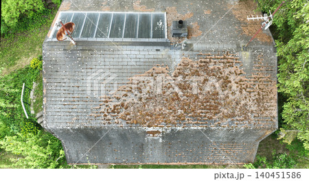 Roof cottage plenty of moss algae lichens house need to clean the attached grows in house transparent cement hut shack blocks to improves log-house its overall appearance prevent damage moisture 140451586