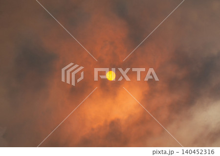 Sun Through Wildfire Smoke Sun Through Wildfire Smoke 140452316