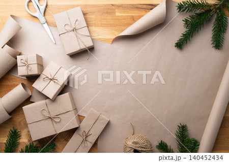 Finished Christmas Gift Wrapping With Twine Bow Finished Christmas Gift Wrapping With Twine Bow 140452434