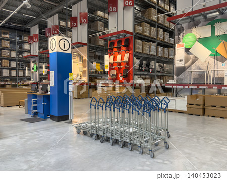 IKEA shop layout with information center and shopping carts in a spacious warehouse IKEA shop layout with information center and shopping carts in a spacious warehouse 140453023