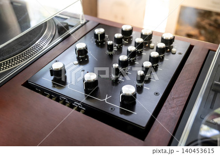 Audio mixer with knob button. Sound mixing console or soundboard panel in music recording studio Audio mixer with knob button. Sound mixing console or soundboard panel in music recording studio 140453615