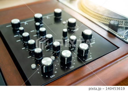 Audio mixer with knob button. Sound mixing console or soundboard panel in music recording studio 140453619