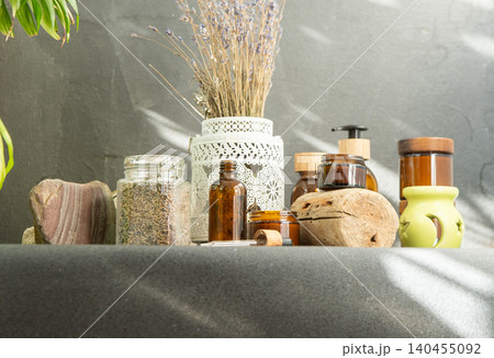 Scented candles and jars bottles with essential oil. Dried lavender. Aromatherapy 140455092