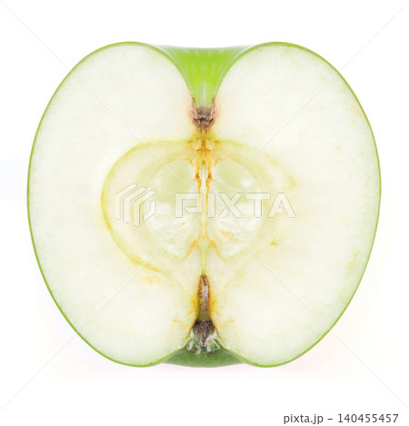 a photo of half green apple isolated on white background 140455457