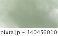 暗いグリーンの水彩が画用紙に滲む背景イラスト 140456010