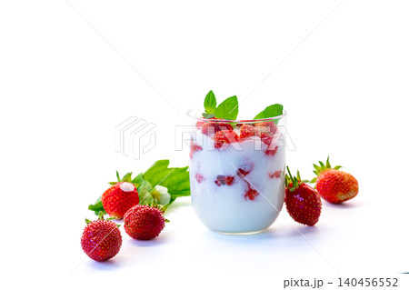 Healthy creamy yogurt with ripe strawberries and mint Healthy creamy yogurt with ripe strawberries and mint 140456552