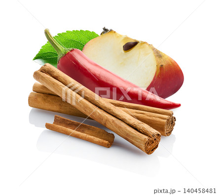 Apple slice with cinnamon bark and hot pepper 140458481