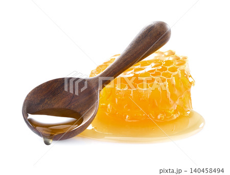 Honeycomb with honey on white background 140458494