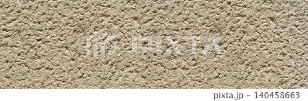 Rough textured beige stone wall surface background 140458663