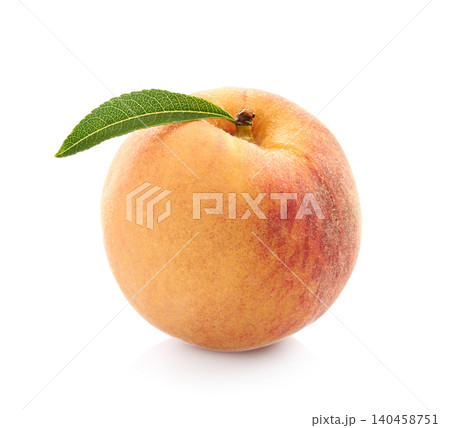 Peach with leaves in closeup on white background 140458751
