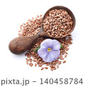 Flax seeds with flowers on white background 140458784