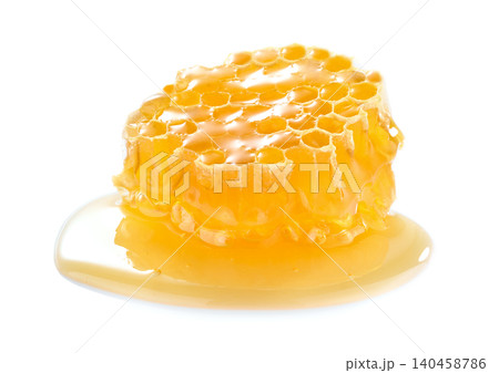 Honeycomb with honey on white background Honeycomb with honey on white background 140458786