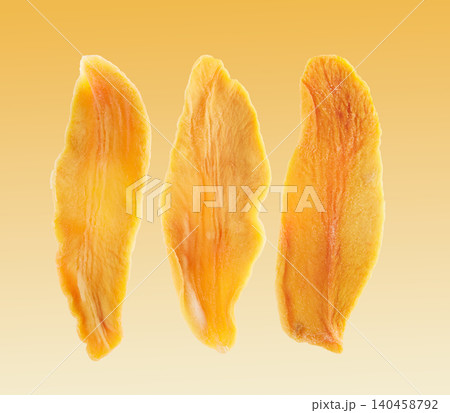 Mango slices dehydrated in closeup Mango slices dehydrated in closeup 140458792