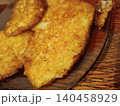 French toast slices showing a close-up view of their golden brown, crispy texture, appealing for a comforting and traditional breakfast or brunch meal 140458929