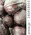 Red cabbage heads displaying vibrant purple and red colors, showcasing freshness and healthy eating, ready for cooking and preparing nutritious meals 140458933