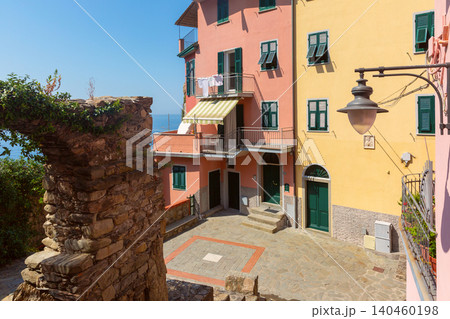 Colorful Residential Buildings and Historic Stone Ruins in Manarola Italy Colorful Residential Buildings and Historic Stone Ruins in Manarola Italy 140460198