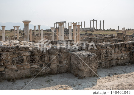 Wander through the ancient ruins of Laodikeia, where stone walls and magnificent columns reflect a rich history amidst a tranquil setting. Wander through the ancient ruins of Laodikeia, where stone walls and magnificent columns reflect a rich history amidst a tranquil setting. 140461043