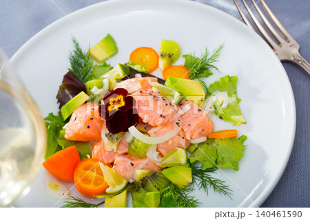 Ceviche of salmon with avocado, kumquat and dill Ceviche of salmon with avocado, kumquat and dill 140461590