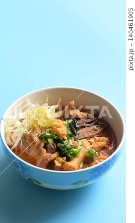 rice vermicelli with northern thai curry sauce on blue background rice vermicelli with northern thai curry sauce on blue background 140461905