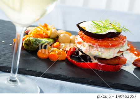 Grilled eggplants with tomatoes 140462057