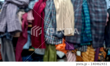 Defocused Retail Fashion Shop Display with Plaid Shirts Defocused Retail Fashion Shop Display with Plaid Shirts 140462431