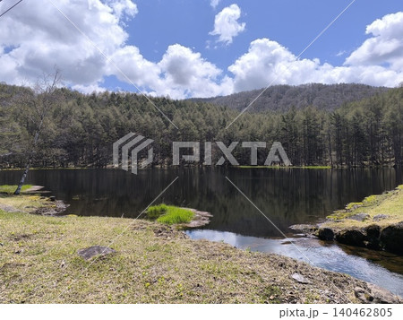 Stunning Mirror Water of Mishaka Pond Under Blue  140462805