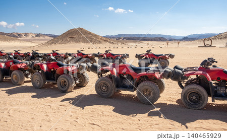 Explore the vast expanse of the Sinai desert while enjoying a thrilling quad motorbike safari near Sharm el Sheikh Egypt. 140465929