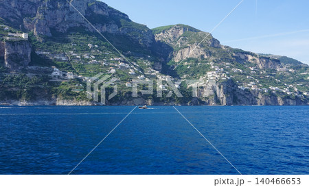 The charming Italian seaside Il Duoglio Spiaggia, rocky cliffs with magnificent views of the Amalfi coast. The charming Italian seaside Il Duoglio Spiaggia, rocky cliffs with magnificent views of the Amalfi coast. 140466653