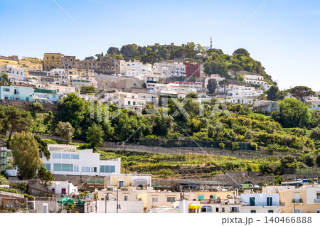 Coastal slopes of the island Capri with luxurious villas located on them. Coastal slopes of the island Capri with luxurious villas located on them. 140466888